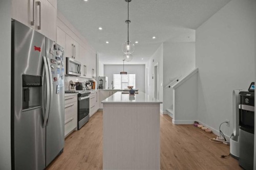 7581 202 Avenue Se, Calgary, AB - Indoor Photo Showing Kitchen With Stainless Steel Kitchen With Upgraded Kitchen