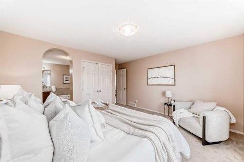 1046 Channelside Way Sw, Airdrie, AB - Indoor Photo Showing Bedroom