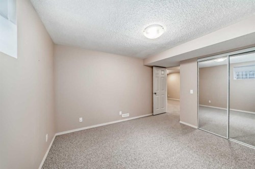 1046 Channelside Way Sw, Airdrie, AB - Indoor Photo Showing Other Room