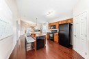 1046 Channelside Way Sw, Airdrie, AB  - Indoor Photo Showing Kitchen 