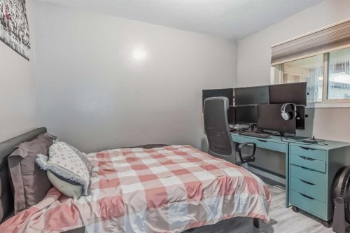 163 Taracove Estate Drive Ne, Calgary, AB - Indoor Photo Showing Bedroom