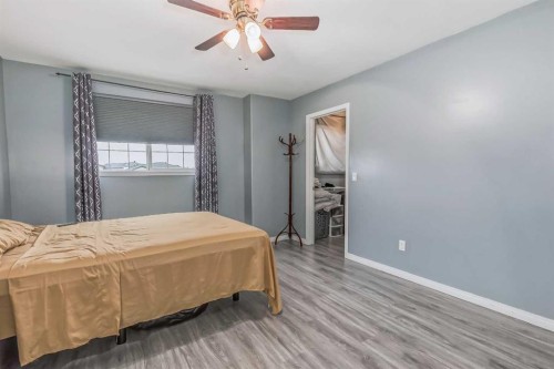163 Taracove Estate Drive Ne, Calgary, AB - Indoor Photo Showing Bedroom