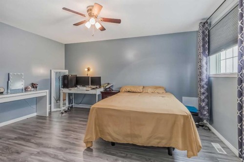 163 Taracove Estate Drive Ne, Calgary, AB - Indoor Photo Showing Bedroom