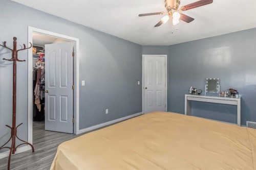 163 Taracove Estate Drive Ne, Calgary, AB - Indoor Photo Showing Bedroom