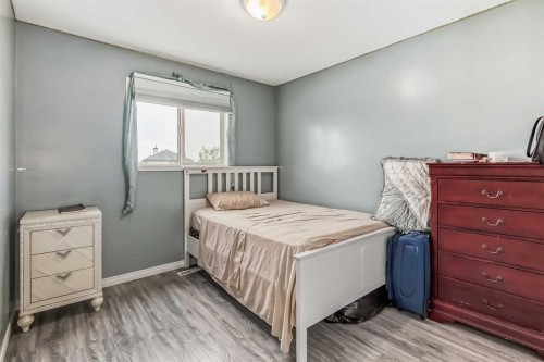 163 Taracove Estate Drive Ne, Calgary, AB - Indoor Photo Showing Bedroom
