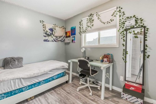 163 Taracove Estate Drive Ne, Calgary, AB - Indoor Photo Showing Bedroom