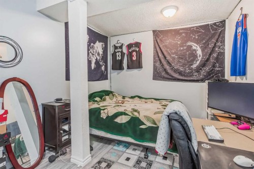 163 Taracove Estate Drive Ne, Calgary, AB - Indoor Photo Showing Bedroom