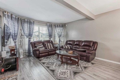 163 Taracove Estate Drive Ne, Calgary, AB - Indoor Photo Showing Living Room