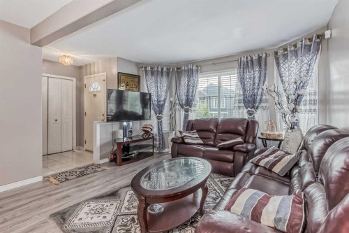 163 Taracove Estate Drive Ne, Calgary, AB - Indoor Photo Showing Living Room