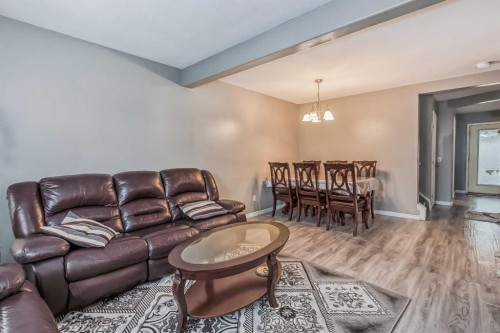 163 Taracove Estate Drive Ne, Calgary, AB - Indoor Photo Showing Living Room