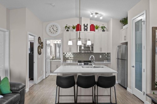 1426-2461 Baysprings Link Sw, Airdrie, AB - Indoor Photo Showing Kitchen With Stainless Steel Kitchen With Double Sink