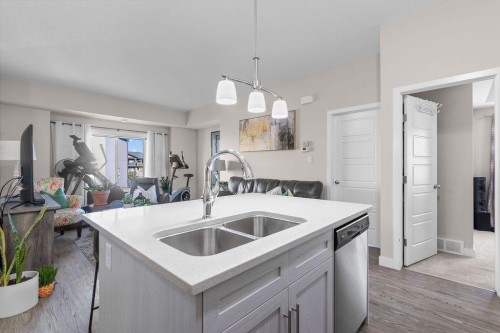 1426-2461 Baysprings Link Sw, Airdrie, AB - Indoor Photo Showing Kitchen With Double Sink