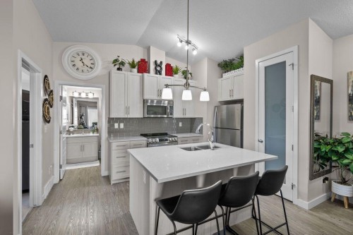 1426-2461 Baysprings Link Sw, Airdrie, AB - Indoor Photo Showing Kitchen With Stainless Steel Kitchen With Double Sink