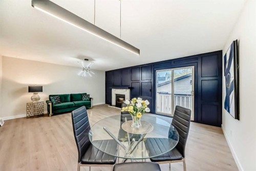 311 Shawnessy Drive Sw, Calgary, AB - Indoor With Fireplace