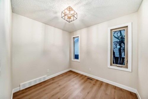 311 Shawnessy Drive Sw, Calgary, AB - Indoor Photo Showing Other Room