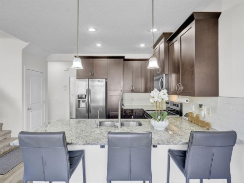 551 Evansborough Way Nw, Calgary, AB - Indoor Photo Showing Kitchen With Upgraded Kitchen