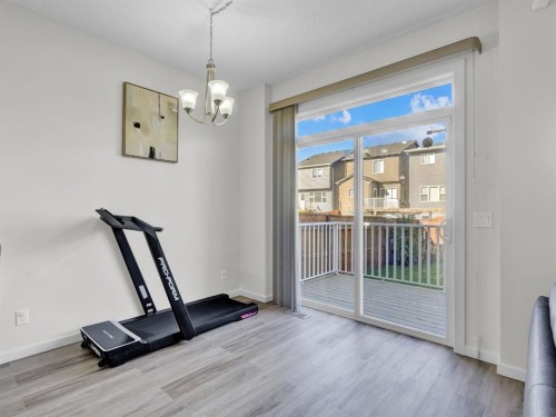 551 Evansborough Way Nw, Calgary, AB - Indoor Photo Showing Gym Room