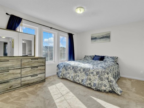551 Evansborough Way Nw, Calgary, AB - Indoor Photo Showing Bedroom