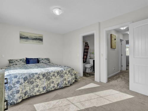 551 Evansborough Way Nw, Calgary, AB - Indoor Photo Showing Bedroom