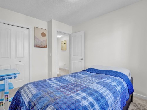 551 Evansborough Way Nw, Calgary, AB - Indoor Photo Showing Bedroom