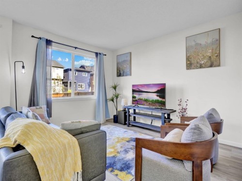 551 Evansborough Way Nw, Calgary, AB - Indoor Photo Showing Living Room