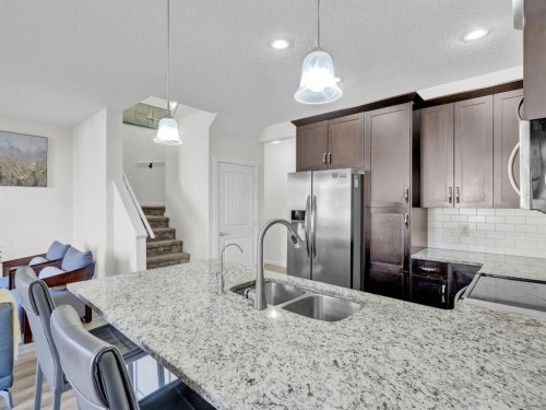 551 Evansborough Way Nw, Calgary, AB - Indoor Photo Showing Kitchen With Double Sink With Upgraded Kitchen