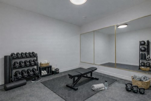 3207 Alfege Street Sw, Calgary, AB - Indoor Photo Showing Gym Room