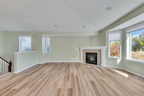 140 Valley Ridge Heights Nw, Calgary, AB - Indoor Photo Showing Living Room With Fireplace