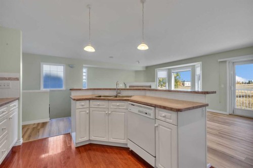 140 Valley Ridge Heights Nw, Calgary, AB - Indoor Photo Showing Kitchen With Double Sink