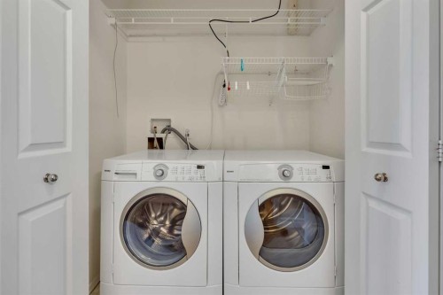 140 Valley Ridge Heights Nw, Calgary, AB - Indoor Photo Showing Laundry Room
