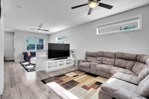 87 Redstone Boulevard Ne, Calgary, AB - Indoor Photo Showing Living Room