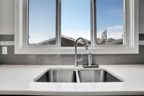 87 Redstone Boulevard Ne, Calgary, AB - Indoor Photo Showing Kitchen With Double Sink