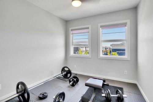 87 Redstone Boulevard Ne, Calgary, AB - Indoor Photo Showing Gym Room
