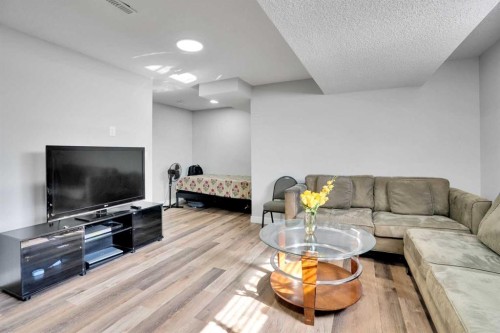 87 Redstone Boulevard Ne, Calgary, AB - Indoor Photo Showing Living Room
