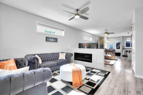 87 Redstone Boulevard Ne, Calgary, AB - Indoor Photo Showing Living Room With Fireplace