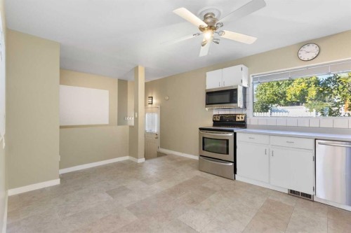 58 Kingsland Place Sw, Calgary, AB - Indoor Photo Showing Kitchen With Stainless Steel Kitchen