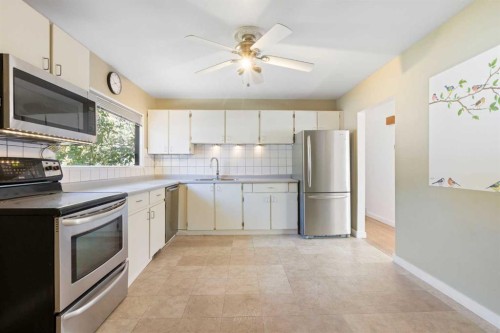 58 Kingsland Place Sw, Calgary, AB - Indoor Photo Showing Kitchen With Stainless Steel Kitchen