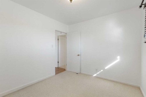 58 Kingsland Place Sw, Calgary, AB - Indoor Photo Showing Other Room