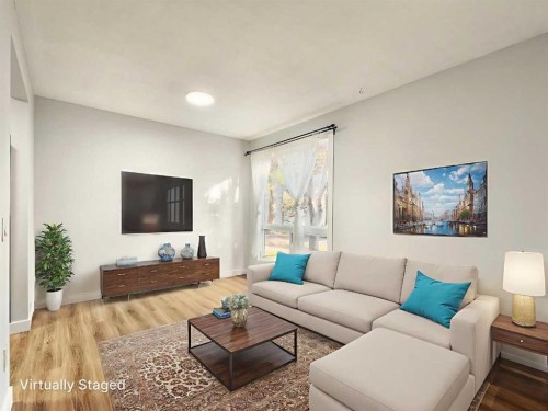 92-6915 Ranchview Drive Nw, Calgary, AB - Indoor Photo Showing Living Room