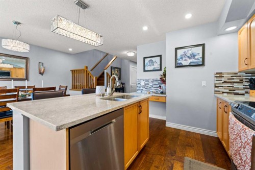 9287 Saddlebrook Drive Ne, Calgary, AB - Indoor Photo Showing Kitchen With Double Sink