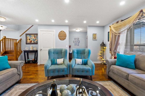 9287 Saddlebrook Drive Ne, Calgary, AB - Indoor Photo Showing Living Room