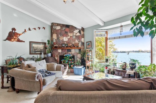 1044 West Chestermere Drive, Chestermere, AB - Indoor Photo Showing Living Room
