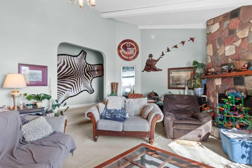 1044 West Chestermere Drive, Chestermere, AB - Indoor Photo Showing Living Room