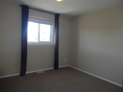 310 Sunrise Terrace Ne, High River, AB - Indoor Photo Showing Other Room