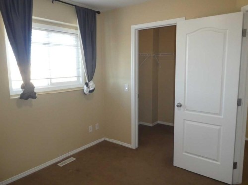 310 Sunrise Terrace Ne, High River, AB - Indoor Photo Showing Other Room