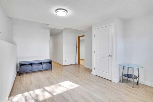 52 Erin Park Drive Se, Calgary, AB - Indoor Photo Showing Other Room