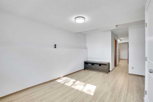 52 Erin Park Drive Se, Calgary, AB - Indoor Photo Showing Other Room