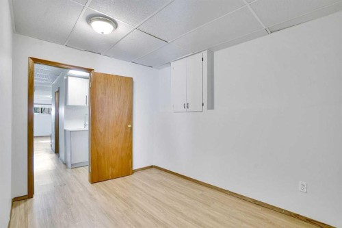 52 Erin Park Drive Se, Calgary, AB - Indoor Photo Showing Other Room