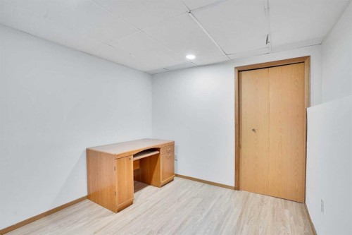 52 Erin Park Drive Se, Calgary, AB - Indoor Photo Showing Other Room