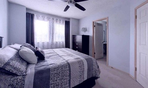 12 Shawbrooke Court Sw, Calgary, AB - Indoor Photo Showing Bedroom